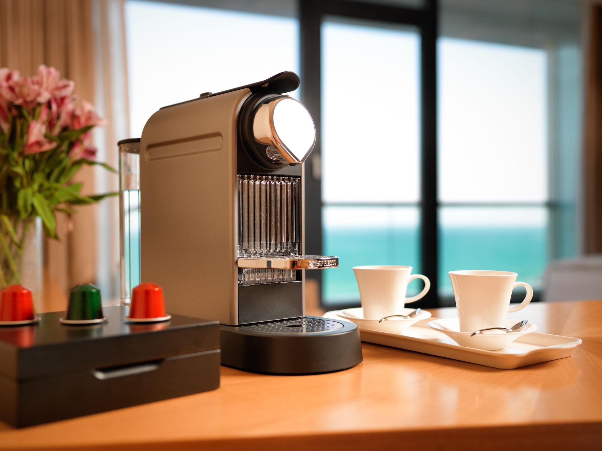 Bilgah Beach Hotel Exterior foto A Nespresso machine